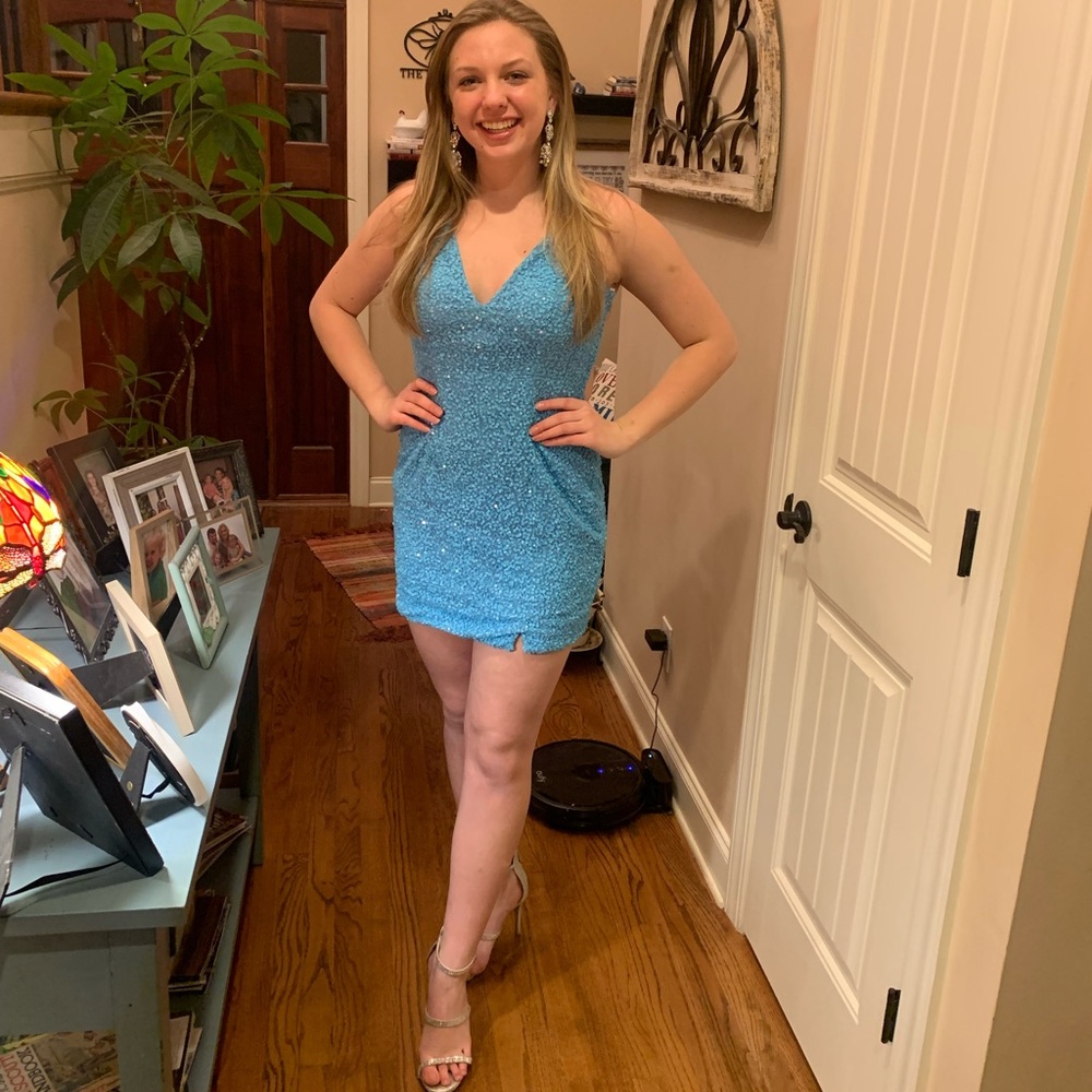 Primavera style 3291 aquamarine professionally altered to cocktail length
